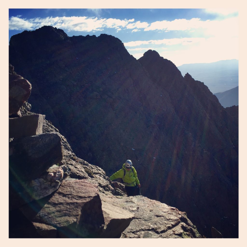 Ray Cameron on the summit ledges of Cretonne Peak