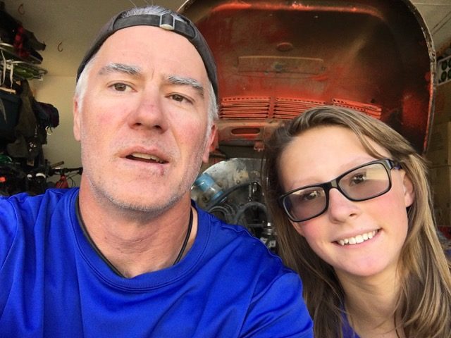 Eric and his daughter turning VW wrenches together