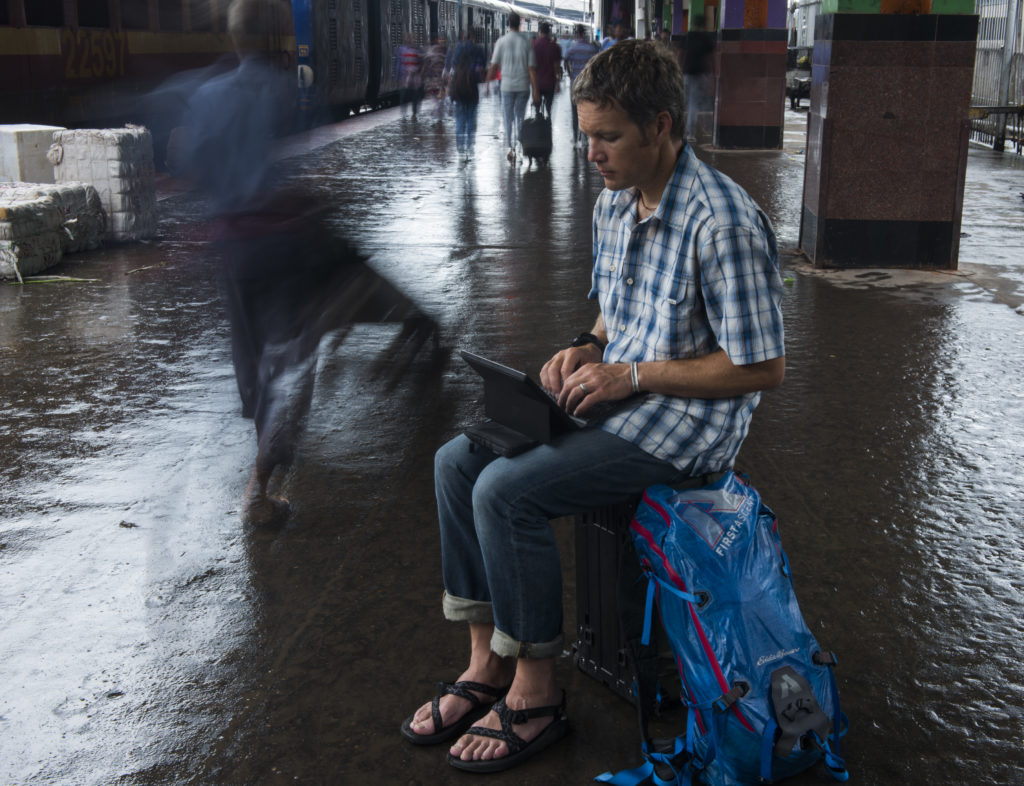 Jake Norton and Dave Morton pass through the Calcutta train station on their Ganges River Expedition, 2013.
